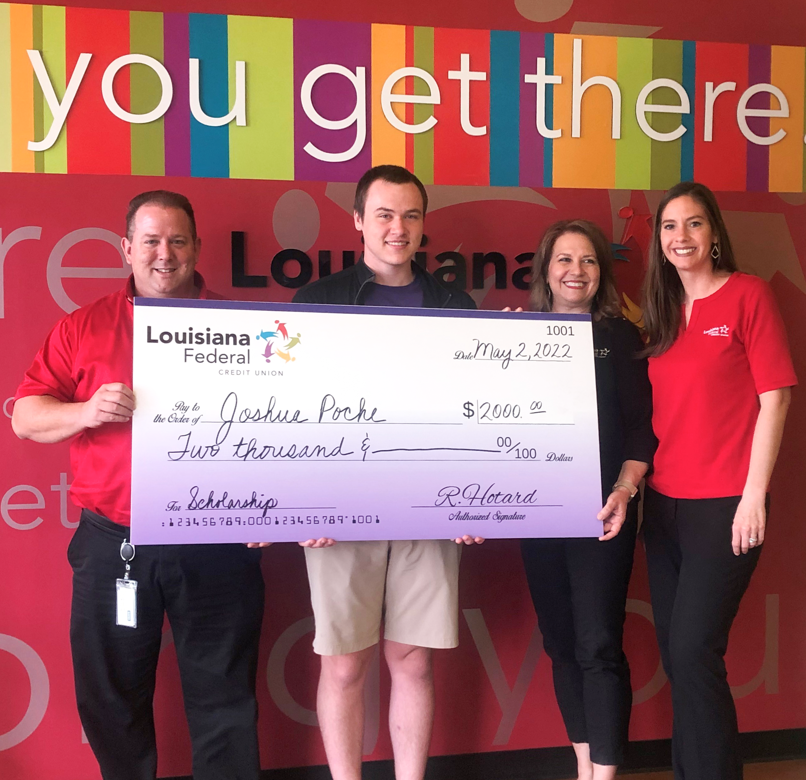R.E.T. Scholarship winner Joshua Poche with Lutcher High School