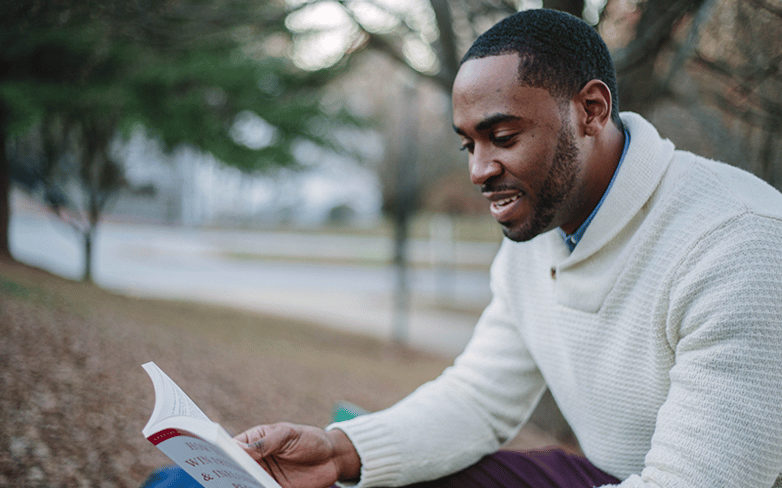 A guy reading a book
